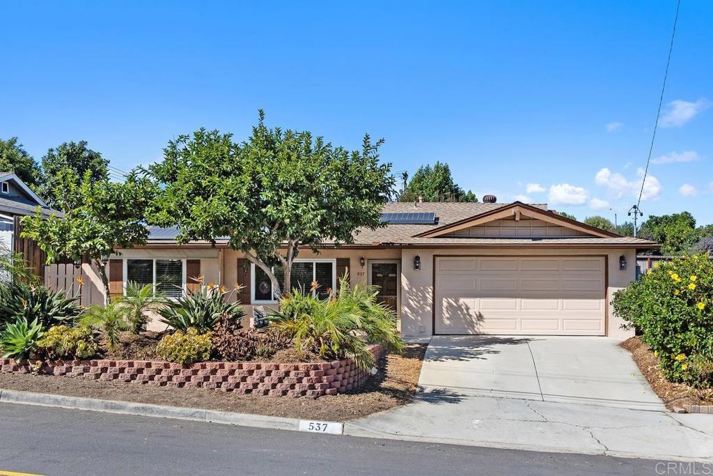 Welcome to this charming single story home which offers a perfect blend of style, comfort, outdoor living and timeless charm with no HOA dues and paid-off solar through 2033. Step inside to find a light-filled living room, perfect for relaxing or entertaining. The thoughtfully designed layout also includes three well-sized bedrooms, a full bath and a smartly arranged kitchen. Start your mornings with a cup of coffee on the shaded patio and enjoy the peaceful charm of this spacious backyard which is perfect for relaxing, outdoor dining, and entertaining. A true gardener’s paradise awaits in this backyard orchard! The property is graced with an impressive variety of fruit trees, offering fresh harvests throughout the year. Imagine stepping outside and picking your own fruit for morning smoothies, baking, or simply enjoying right off the tree. Enjoy the zest of lemons and limes, the tropical sweetness of guava, the creamy richness of figs, and the complex flavor of persimmons. Seasonal favorites include crisp apples, juicy oranges, sun-ripened plums, and fragrant nectarines. You’ll also find a passionfruit and peach tree, adding even more charm and abundance to this outdoor oasis. This yard is more than just a space - it’s a lifestyle and perfect for Califonia’s year round sunshine. Other benefits include dual pane windows, stainless appliances and the home is set up with a rainwater collection system capable of storing up to 350 gallons. Situated just minutes from shopping, dining, Brengle Terrace Park, The Moonlight Amphitheater and freeways, this home offers the perfect blend of convenience and accessibility for an effortless lifestyle which makes it such a special place to live. Do not miss out on this wonderful home. This is truly California living at its best!