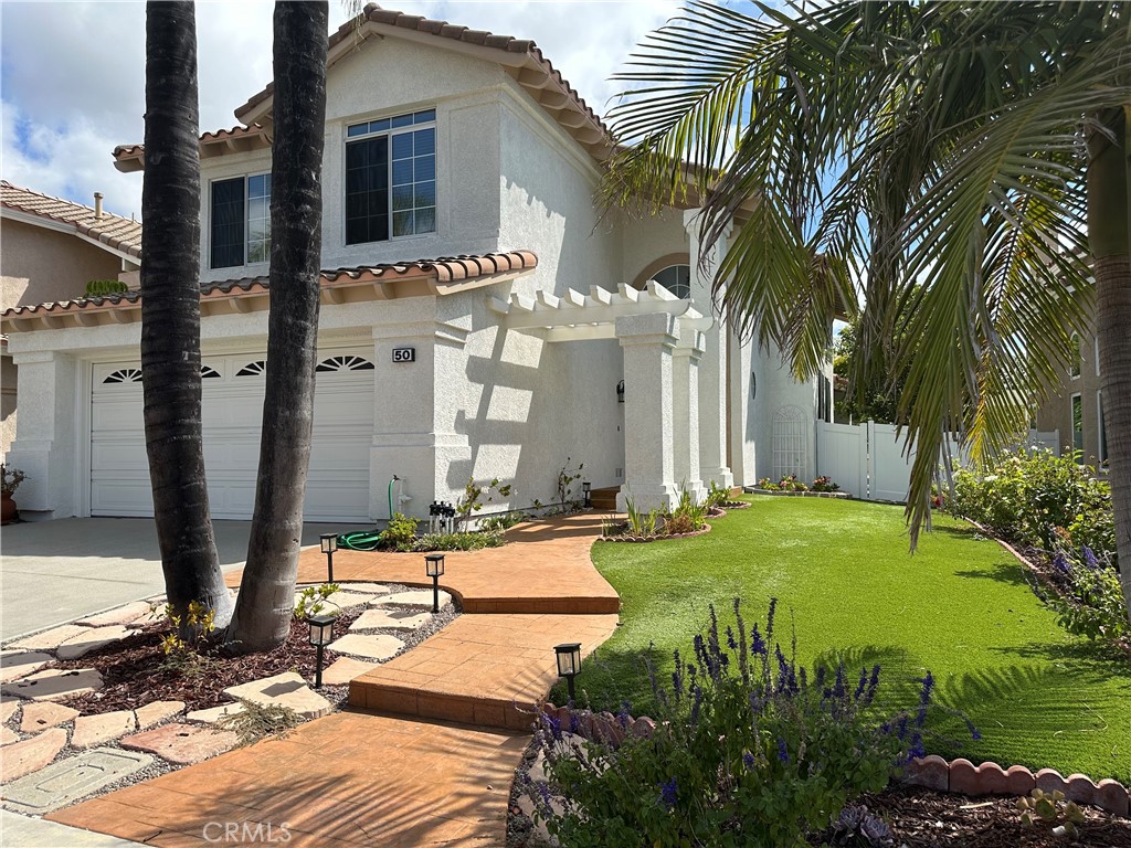 This is it. A unique solution to your unique needs. Beautifully upgraded throughout with a huge downstairs ensuite that comfortably accommodates a nanny or maid, elderly parents, older children, or the perfect retreat for out of town guests. The possibilities are endless. Located in the family friendly community of Foothill Ranch and within walking distance of Blue Ribbon Foothill Ranch Elementary School and the Foothill Ranch Library. Shopping and food amenities galore with easy access to the 241 toll road or just straight down Alton Pkwy to the 5 and 405 Fwys. 20 minutes to John Wayne Airport, 30 minutes to the beach, and 55 minutes to the mountains. Surf in the morning and ski in the afternoon. Hiking, biking, association pool, spa, and parks are enough options to keep you active year around. No one behind you for complete privacy. This location cannot be beat. The photos speak for themselves so no need to explain the obvious. Don't miss out. Schedule your appointment today.