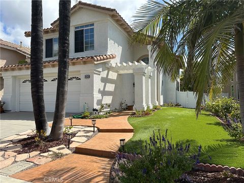 Photo of 50 Tavella Place, Lake Forest, CA 92610 (MLS # PW25219474) Photo of 50 Tavella Place, Lake Forest, CA 92610 (MLS # PW25219474)