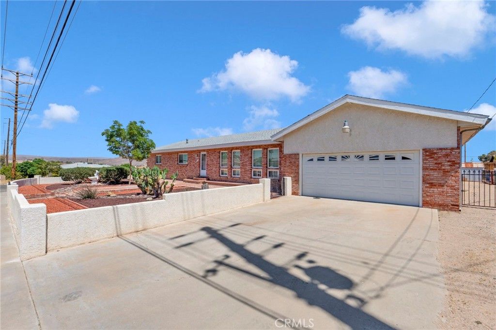 Photo of 1231 Mecca Drive, Barstow, CA 92311 (MLS # CV26082720)