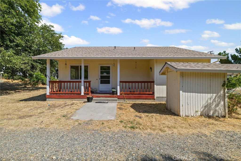 Great Orland Location on Co Rd P! Enjoy easy access to Hwy 32 for a quick commute to Chico or a short drive into town. Nestled next to Stony Creek, this property sits on a spacious 0.38-acre lot, offering plenty of room to spread out. The main home features 2 bedrooms, 2 bathrooms, and a bonus room—perfect for an office or possible 3rd bedroom. Inside, you’ll find a large kitchen with custom-built cabinetry, plus a convenient laundry room off the kitchen. Outside, there’s a detached garage with laundry hookups and an additional living space that includes a bathroom and kitchen (not counted in the home’s square footage)—ideal for guests, hobbies, workshop, or extra storage. With its generous lot size and versatile spaces, this property offers so many possibilities!