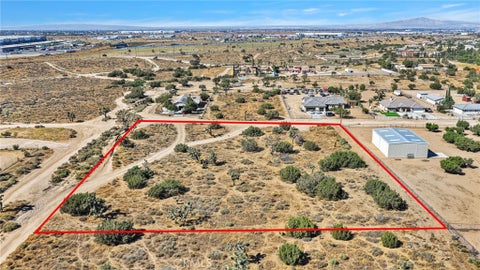 Photo of 7879 Outpost RD, Oak Hills, CA 92344 (MLS # IV26194423)