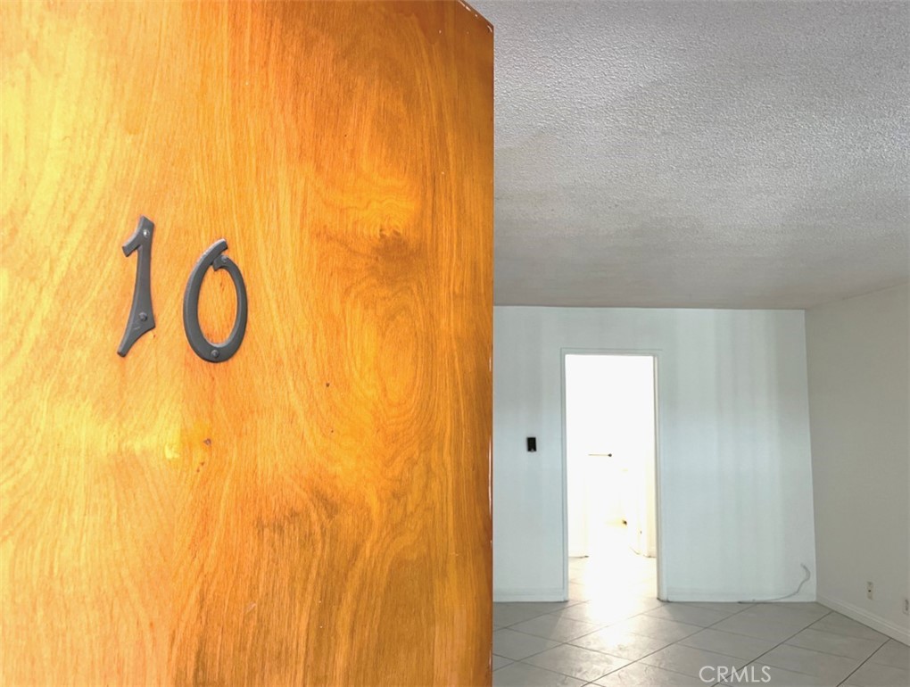 Experience the best of coastal and urban living in this charming one-bedroom condo, ideally located in the heart of vibrant Downtown Long Beach. Just minutes from the beach, Shoreline Village, The Pike, and a variety of cafes, shops, and entertainment options, this ground-floor unit offers unbeatable walkability and convenience. Inside, the spacious layout is enhanced by upgraded tile flooring, fresh paint, and abundant natural light streaming through large windows, giving the home a bright and open feel. The kitchen features natural wood cabinetry, a built-in cooktop, a separate oven, and an adjacent dining area, blending functionality with classic charm. Cross-cut tile and vertical blinds add a modern touch, while the secure gated entry provides peace of mind. Enjoy the beautifully maintained courtyard and a location that places you just blocks from Long Beach’s best attractions. Don’t miss this opportunity to live steps from the sand in one of the most sought-after neighborhoods near Alamitos Avenue and Ocean Boulevard.