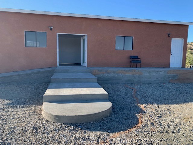 Completely remodeled Manufactured home with 3 bedrooms and 2 baths with new flooring, new kitchen cabinets and appliances, completely upgraded bathrooms, new concrete ramps, windows, Stucco, paint, doors and many other nice features. This property in a very quiet area with views of the mountains. Permits with the City needing to be Processed as well as installing a Septic System. Great Deal for the Price.....Property Survey done on this property as well as Soil and Percolation Test done. Cash or Hard Money loans only...... Hurry and schedule your showing now!!!!
