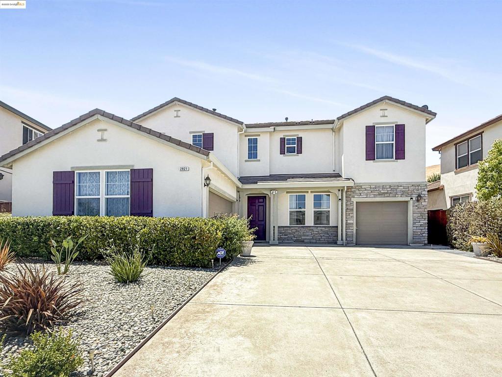 2921 Rio Verde Drive is a well-maintained, spacious, and thoughtfully upgraded home located in the sought-after San Marco neighborhood of Bay Point. This two-story residence offers over 3,545 square feet of comfortable living space, perfect for larger households or multigenerational living. The home features 4 generous bedrooms and 3.5 bathrooms, including a full bedroom and bath on the main level—ideal for guests, extended family, or a private office setup. Inside, the home boasts an open-concept layout with soaring ceilings and abundant natural light. The gourmet kitchen is equipped with granite countertops, ample cabinetry, a walk-in pantry, and a breakfast nook. The family room is prewired for surround sound, making it easy to create a home theater experience. Additional highlights include hardwood floors, recessed lighting, a gas fireplace, and dual-zone central heating and air conditioning. Owned by the original owner, this home sits on a large 10,890 sq ft lot with a backyard oasis and mature fruit trees. The front yard is low maintenance, and the 3-car garage offers ample room for parking and storage. Conveniently located across the street from Delta View Elementary and minutes from BART, freeway access, Sprouts, and more, this home blends comfort and accessibility.