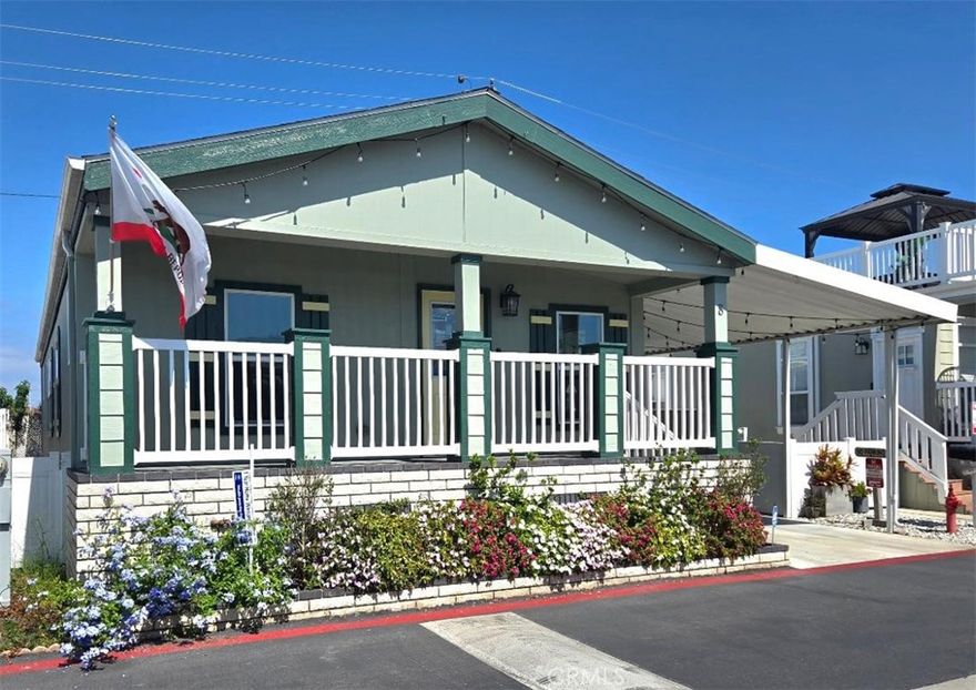 Newer 2017 Beach house!!! Across the street from the OCEAN!!! This Awesome house is in the lovely, “Huntington by the Sea” gated community, look no more! Walk to the beach in 3 minutes!!!  Gorgeous open floor plan, with giant living and dining room. This beautiful home is over 1,488 sqft.  3 bedrooms and 2 bathrooms. This home is light and bright and includes a newer Samsung 3 door French Door Smart refrigerator in white glass, dishwasher, LG WashTower Washer and Dryer with Turbowash “Nature green” in separate laundry room. Carport attached to the home to fit 2-3 cars.  Guest parking is also available. UPGRADES INCLUDE: Front of house landscaped; Water irrigation system installed; Attached outside Giant Shed with flooring installed. 54’x6’ new white vinyl fence with lattice on top and gate on side of house. Custom handmade stained-glass window installed over sink in kitchen and custom front door with handmade stain glass window. Quarts countertops in kitchen and bathrooms. Front door camera. Front and side electric key coded door locks, app controlled. New kitchen sink faucet. Kitchen cabinets are soft-closing. Walk-in pantry with glass door. Entire Inside of home just painted and ADT security system. Brand new faux wooden blinds installed throughout. Installed 3-ton, A/C system with Senis smart thermostat (app-based software so can be controlled from a smart phone. Brand New Recessed lighting throughout home. Brand new 4.5-inch baseboards throughout home, and beautiful crown molding. 5 Brand-new remote-controlled fans in all rooms! Custom shower/soaker tub (60x36x19) installed with new fixtures. An upper deck can be built over the carport to have amazing views from your home. The monthly park lease is only $3,860.00 a month which includes access to the newly upgraded community clubhouse, dog park, pool, hot tub, game room and full gym all located in the park’s private gated community with private security patrol. Located down the street from the famous Huntington Beach Pier and the new "Pacific City" with new shops and restaurants. 1-year full home warranty!!! Call Brett Siciliano with Remax 714.553.2738