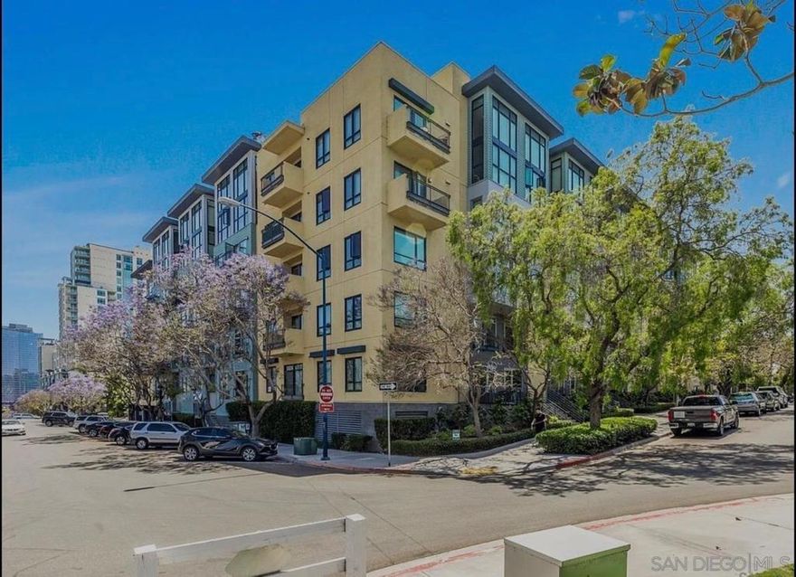 Bright—and beautifully located—2 bedroom, 2 bath corner unit boasting abundant natural light throughout. Enjoy serene views of blooming jacaranda trees and the lush expanse of Balboa Park from your living room and private balcony.  Step into your sleek, newly redesigned custom kitchen featuring modern finishes and stylish details. Additional perks include in-unit large-capacity laundry, and the ease of a doorman-staffed building. Resort-style amenities await you, including a sparkling pool, BBQ area, jacuzzi, fire pit and a fully equipped gym. One parking space on a lift (capable of fitting two cars) is included. Located in a Residential Permit Parking District F.  Walkable to lively nightlife and nestled in a cozy, safe community — and yes, pet friendly!  Owner includes trash and water. Tenant responsible for electric and cable.