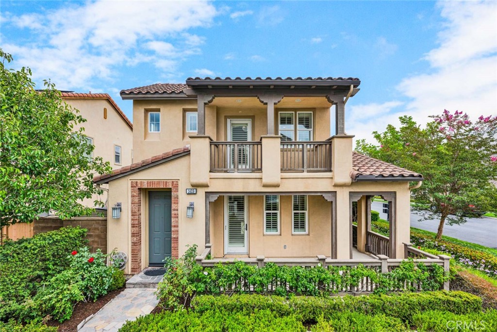 Welcome to 1429 Georgia Street, a Move-In Ready Home Located on a Corner Lot in the Highly Sought After Columbus Square Community of Tustin Legacy. This Dream Home Showcases Three Bedrooms, Two and a Half Bathrooms, Hardwood Floors, Crown Moulding, Dual Pane Windows, Plantation Shutters, and an Abundance of Natural Light Throughout. The Spacious Living Room Enjoys a Cozy Fireplace and Porch Access. The Kitchen Boasts Granite Counters, Island with Seating, Stainless Steel Appliances, and Opens Directly to the Dining Room with Backyard Access, Perfect for Entertaining. The Expansive Master Suite Showcases a Private Balcony and Ensuite Bathroom with Dual Vanities, Walk-In Closet, Walk-In Shower, and Separate Tub. The Laundry Room is Conveniently Located Upstairs with a Sink and Built-In Cabinets. The Low Maintenance Private Backyard Features a Beautiful Flagstone Patio, Fruit Trees (Orange, Lemon, Lime, Avocado, Apple, and Fig), Pergola, and Outdoor Kitchen with Built-In BBQ, New Mini Fridge, and Sink. Direct Access Two Car Garage. HOA Amenities Include a Community Pool, Jacuzzi, Clubhouse, Gym, Greenbelts, Playground, and Sports Courts. Award Winning Tustin Unified Schools: Legacy Magnet Academy and Heritage Elementary. Walk to the Village at Tustin Legacy with Numerous Shops/Restaurants, Hoag Urgent Care, and Veterans Sports Park. Short Drive to the District and Irvine/Tustin Marketplace, Two Costcos, Whole Foods, Amazon Fresh, 5/55/405 Freeways, and 261/241/133 Toll Roads. 1429 Georgia Street is a Must See!