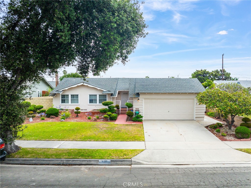 Welcome to this beautifully updated 3 bedroom, 2 bathroom home nestled in West Anaheim, just 3 miles from Disneyland and close to shopping, schools, and freeways. With 1,374 square feet of living space, this home combines charm, comfort, and convenience in one inviting package.
Step inside to find stunning hardwood floors flowing throughout the home, accentuating the light and airy interior. The remodeled kitchen features stainless steel appliances, modern cabinetry, and ample counter space perfect for cooking and entertaining alike.
The primary suite includes a thoughtfully upgraded bathroom with a walk-in shower and a separate walk-in tub, offering both accessibility and spa-like relaxation. Two additional bedrooms provide plenty of space for family, guests, or a home office.
Outside, enjoy the spacious covered patio, ideal for outdoor dining or weekend gatherings. The backyard is lined with mature fruit and citrus trees, providing a peaceful setting and a bounty of fresh produce.
Whether you’re looking for a primary residence or a vacation home close to the magic of Disneyland, this turnkey home is a rare find in a highly sought-after area.