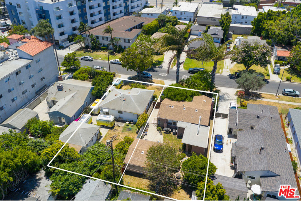 2318-2322 Wellesley Avenue offers a rare double-lot development opportunity in the heart of West Los Angeles. Spanning 12,500 SF with 100 feet of frontage, the site is zoned R3(EC) under the Exposition Corridor Transit Neighborhood Plan and sits just 0.2 miles from the Expo/Bundy Metro Station, qualifying it for AB 2097's parking exemption and multiple density bonuses. Preliminary feasibility studies indicate potential for up to 66 units through the Mixed Income Incentive Program (MIIP), or up to 95 units via the Affordable Housing Incentive Program (AHIP), with a max FAR of 4.65:1 and buildable area nearing 39,092 SF. The site is currently improved with two tenant-occupied single-family homes generating $9,100/month and is not subject to rent control. Located between Santa Monica, Brentwood, Westwood, and Culver City, the site benefits from proximity to major employers like Riot Games, Sony Pictures, and Fox Studios, as well as large-scale developments including West Edge and Martin Expo Town Center. With a Walk Score of 88, no RSO restrictions, and no parking requirement, this is a high-impact infill site ideal for delivering new housing to one of LA's most constrained and in-demand rental markets.