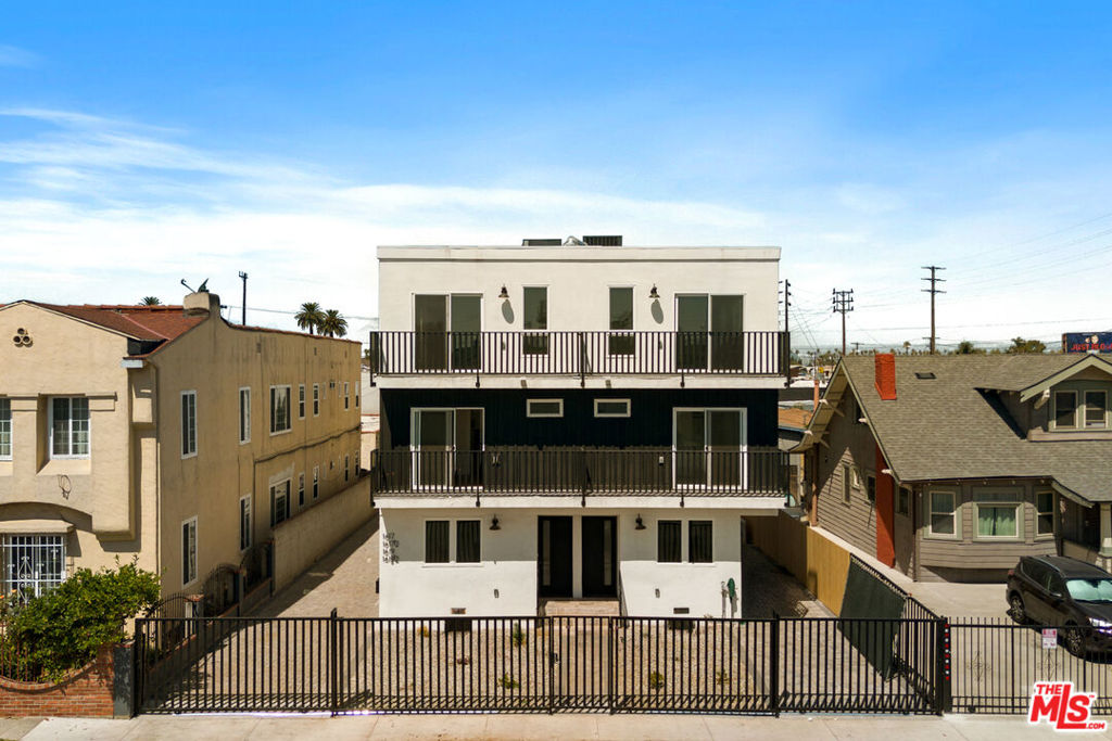 Welcome to 1617 1/2 2nd Ave, a beautifully renovated three-story home featuring five spacious bedrooms and three modern bathrooms in the heart of Mid-City. This bright and airy residence blends contemporary design with versatile living spaces, ideal for families, professionals, and creatives seeking both comfort and functionality.At the center of the home, the open-concept kitchen showcases sleek white cabinetry, quartz countertops, stainless steel appliances, and a bold black faucet that adds a modern touch. Wide-plank flooring, recessed lighting, and dual-pane windows fill the home with natural light and warmth. Multiple living areas, along with a private balcony off the upstairs bedrooms, provide inviting spaces to relax, work, or entertain.The bedrooms offer generous closet space, while the bathrooms feature designer tile, stylish vanities, and matte black fixtures. Additional highlights include in-unit laundry, central air and heat, and gated parking.Perfectly located near Culver City, Downtown LA, and with easy access to the 10 Freeway, this turnkey property combines convenience, modern design, and comfort in one complete package. Broker/Agent does not guarantee or warrant the accuracy of the square footage, lot size, or other information concerning the condition or features of the property. Broker/Agent is not responsible for any inaccuracies contained herein. Tenant is advised to independently verify all information.