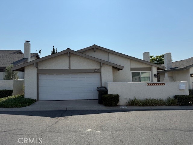 LEASE IN THE CITY OF YORBA LINDA!! IN THE LOVELY COMMUNITY OF WOODGATE!! This 3 bedrooms, 2 bath, 1,002 sq ft single story, fully detached condominium property sits among a community of 231 units. It has been remodeled and features throughout the house are dual pane windows, travertine and wood flooring, each room has a ceiling fan with remote, modern lighting fixtures, electrical upgrades, water softener, vinyl window shutters, newer A/C unit, large walk in closets and designer paint. The kitchen is a chef's dream: spacious island with 4 burners and copper prep sink with ample seating, shaker style custom cabinetry, stainless steel appliances (with refrigerator staying), quartz countertops, marble backsplash and over size porcelain farm style sink. Stylish barn doors to the Primary Bedroom which has natural lighting and large walk in closet. Full bathroom is ensuite with quartz counter vanity, custom glass walk in shower with river rock and a luxurious rain shower head. The full bathroom has been updated with a door to the other bathroom so there is access to the shower. Direct access to the 2 car garage where the laundry is located. (Washer & Dryer are staying). Woodgate Community has a clubhouse and 2 pools, one is a kiddie pool. Public access to Woodgate Park so enjoy basketball court, tennis & racquet ball/handball court and grassy area. *See photos showing modification of bathroom with additional door.