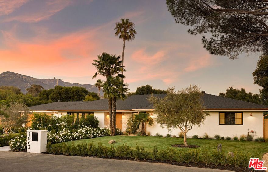 Set in the heart of Santa Barbara, Casa de Verano is a masterful expression of modern California living, where thoughtful design, craftsmanship, and comfort converge. This single-level estate was professionally redesigned and rebuilt with full permits, ensuring every system, finish, and feature meets today's highest standards. For the buyer, that means confidence in quality, peace of mind in craftsmanship, and the ease of truly turnkey living, all within an established neighborhood that reflects the timeless beauty of Santa Barbara architecture. Every detail has been thoughtfully completed, every inspection satisfied, and every element refined to perfection, so all that's left to do is move in and begin living.Behind its classic faade lies a home that lives effortlessly. Four bedrooms, five bathrooms, and a dedicated wine room unfold across open, sunlit interiors framed by expansive bi-fold doors showcasing breathtaking mountain views and seamless indoor-outdoor flow.At its heart, the kitchen inspires both daily life and entertaining with custom white oak cabinetry, panel-ready luxury appliances, a 48" Wolf range, and dramatic stone surfaces that extend to the ceilingan elegant blend of form and function. Smart-home features include whole-house audio, integrated security, and easy mobile control.The architectural ADU elevates the property even further with soaring ceilings, two sets of bi-fold doors, a full kitchen, bedroom, bath, and private patioideal for guests, a pool house, or a polished home office.Set on over half an acre of fully usable land, the outdoors are equally impressive: a new pool and spa, putting green, bocce court, built-in BBQ, and a double-sided stone fireplace create a private resort atmosphere perfect for entertaining or quiet relaxation.From copper gutters to curated designer finishes, Casa de Verano reflects a commitment to enduring quality and timeless style. Located in the coveted Mountain View School District, this property represents a rare opportunity to own a home that feels brand new, lives beautifully, and delivers exceptional value in one of Santa Barbara's most desirable neighborhoods.