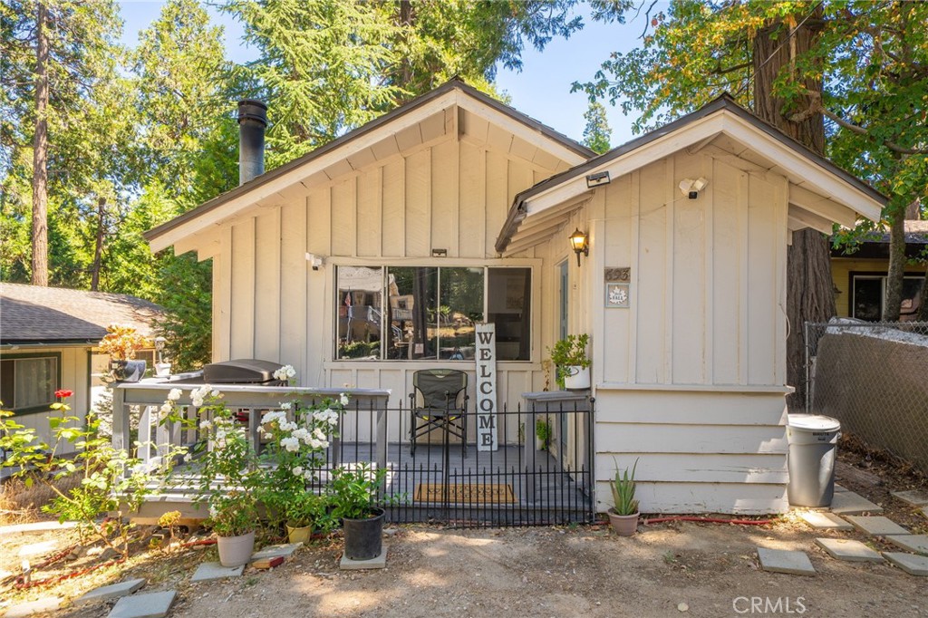 Welcome to Mountain Living! Discover this charming Crestline retreat nestled right off scenic Highway 138. Perfectly situated near Lake Gregory, this home offers the ideal mix of small-town mountain charm and commuter convenience. Whether you’re looking for a full-time residence, vacation home, or an investment property, this is a must-see! Step inside and you’ll be greeted by a cozy, open layout filled with natural light. The living room is anchored by a warm fireplace that makes chilly mountain evenings unforgettable. The kitchen is designed for both functionality and charm, with ample cabinetry and counter space for preparing your favorite meals. Bedrooms are spacious and inviting, offering plenty of comfort and privacy for family or guests. Outside, enjoy crisp mountain air and serene views from your private deck or yard. Imagine morning coffee with the sun rising over the trees, or evenings under the stars. The property includes convenient parking and easy access to the highway—making trips down the hill smooth and simple.
Just minutes from Lake Gregory, hiking trails, and Crestline Village, Cozy living room with fireplace, Peaceful outdoor space for gatherings or quiet relaxation, Convenient location with year-round access to Highway 138, Endless potential as a vacation rental, starter home, or weekend getaway
If you’ve been searching for an affordable escape into the mountains with all the essentials, This is the perfect place to call home. Don’t miss your chance to make this Crestline gem yours~ Schedule a showing today!