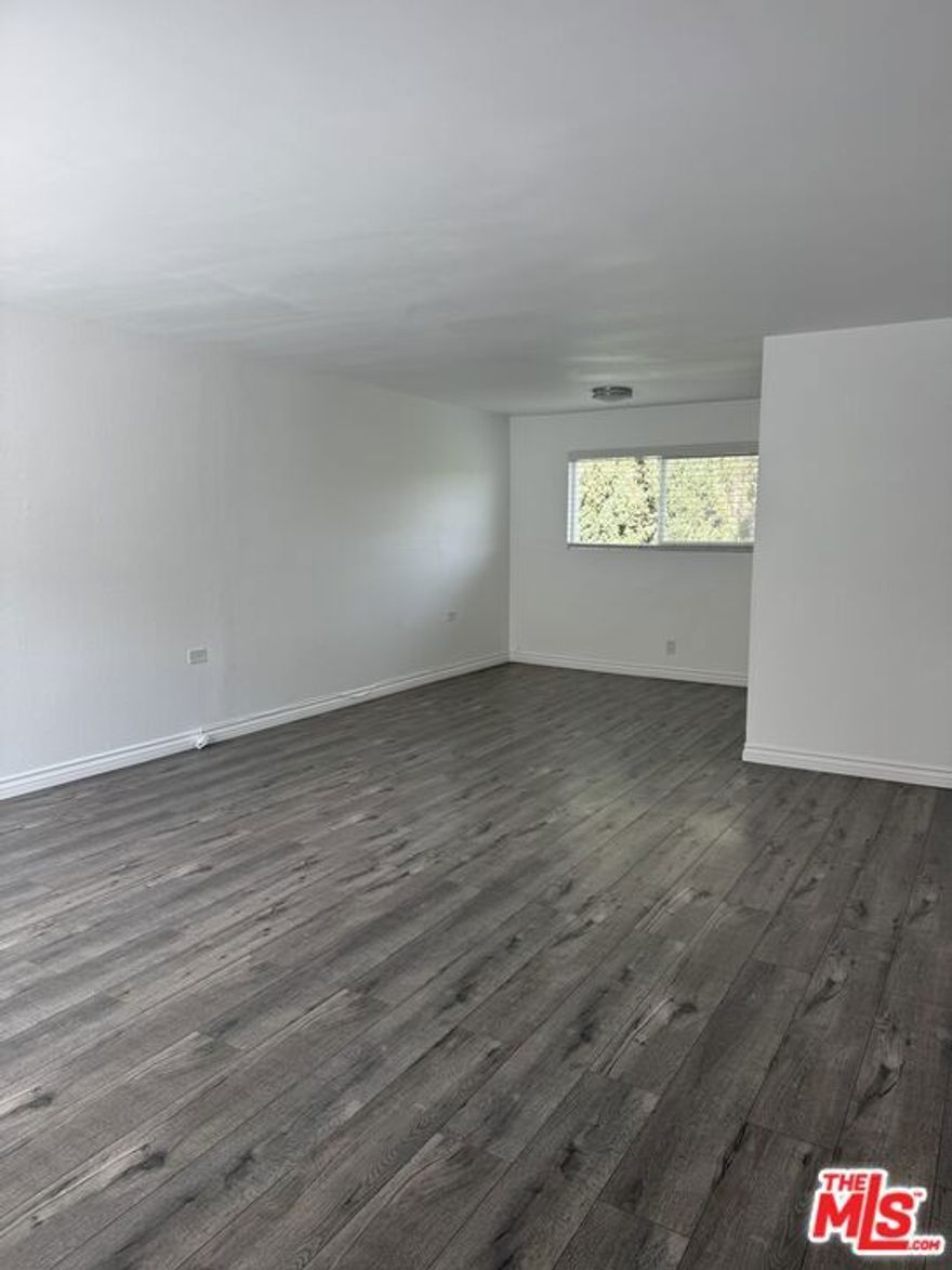 Newly redone 2 bedroom and 1.5 bathroom townhouse style apartment located in the heart of Old Agoura Hills. The apartment has been recently remodeled with new wood laminate floors throughout, new quartz counter tops, stainless steel appliances (fridge, dishwasher,ovens/stove), newly painted walls, plenty of closet space and includes gated parking with a laundry room on site. The building was also recently updated including new exterior paint, secured entrance, an intercom system in the front, and cameras.