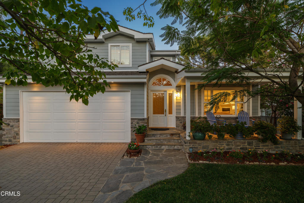 This luxury architectural delight with exceptional attention to detail is waiting for its next chapter. Tucked within a highly sought-after neighborhood, this custom-built residence blends timeless craftsmanship with modern luxury. From the arched entryway & custom glass door, every detail has been thoughtfully curated to create a home of sophistication & comfort. Inside, slate tile floors welcome you & lead into a dramatic living room with vaulted ceilings, custom hardwood floors, a picture window, recessed lighting, a gas fireplace, oversized mantle & crown molding throughout the home. Built-in speakers extend throughout, while dual-pane windows bathe the home in natural light. The dining room has tray ceilings with uplighting, transom windows & a sliding door to a private patio, perfect for dining al fresco. The chef's kitchen is a true showpiece with travertine flooring, an island with bar seating, a walk-in pantry & high-end appliances, including a Viking Professional range, hood, double ovens, dishwasher & a Sub-Zero refrigerator. The kitchen flows into the family room, where hardwood floors & a wood-burning fireplace create a warm gathering space opening to the expansive backyard. Additional main-level highlights include an office (or potential guest suite) with access to a 3/4 bathroom, a mudroom, a laundry room, a stylish powder room & access to the finished 2-car garage. Upstairs, the primary suite is a retreat with vaulted ceilings, hardwood flooring, a fireplace, a walk-in closet & a balcony overlooking the backyard. The spa-like ensuite offers a dual vanity, ambient uplighting, a jetted soaking tub & a separate shower with dual shower heads. Three additional bedrooms feature built-in closets & share a beautifully designed bathroom with a custom tiled shower & tub combination, a dual-sink vanity & a private toilet closet. Beyond the main home, a detached garage/workshop includes a 1/2 bath, built-in cabinetry & a finished bonus space above with skylights, wood-beamed ceilings & flexible use as a game room, studio, or a potential ADU. The backyard is ideal for entertaining or simply relaxing. Additional features include a 50-year fire-rated roof, LeafFilter gutter protection & durable non-flammable Hardie siding for peace of mind. Set in an outstanding school district & a desirable location, this architecturally exquisite home is a rare blend of elegance, comfort, & versatility. Don't miss your opportunity to make this dream home a reality.