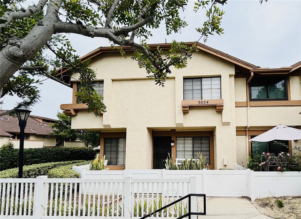 Discover this beautifully updated 3-bedroom, 2.5-bath end-unit condo in Westside neighborhood. Recently remodeled bathrooms and fresh interior paint give this home a modern, move-in-ready feel. Enjoy the peaceful setting with a sparkling pool view, all within a short drive to grocery stores, restaurants, and daily conveniences. The covered patio offers extra storage, making the space as practical as it is inviting. Perfect for those seeking a stylish, low-maintenance home in a quiet, well-located community. Also, trash and water is covered by HOA.