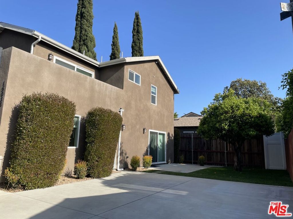 Photo of 15031 15033 Hartland Street, Van Nuys, CA 91405 (MLS # 25557139)