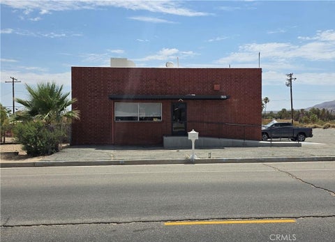 Photo of 6767 Adobe Rd, 29 Palms, CA 92277 (MLS # JT26227003)