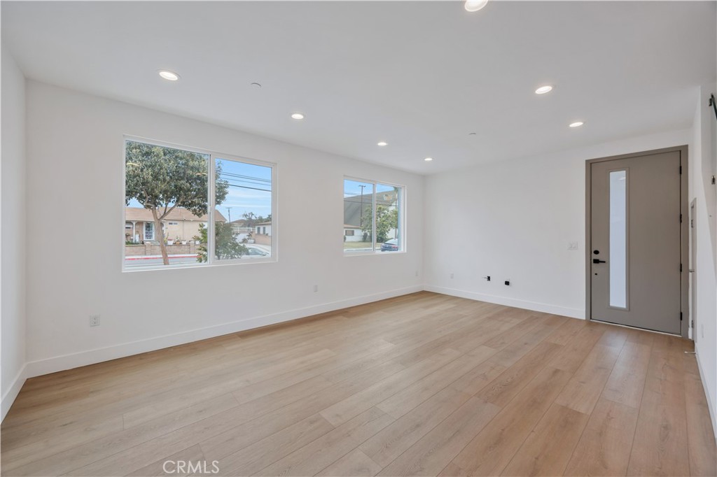 Welcome to this brand-new, beautifully designed home in the heart of Garden Grove! Built in 2025, this spacious 2,148 sq. ft. property offers 4 bedrooms and 3.5 bathrooms, including two master suites, perfect for multi-generational living or those seeking extra comfort and privacy. This home features soaring 10-ft ceilings, premium finishes throughout, a sleek modern kitchen with top-of-the-line appliances. Additional amenities include a 2-car garage for secure parking and storage, as well as a convenient washer and dryer hookup to make laundry a breeze. The property is ideally located near 22-freeway, Disneyland, and dining options, offering both convenience and charm. Please Text or call Jay with date and time of showing 949-392-6614