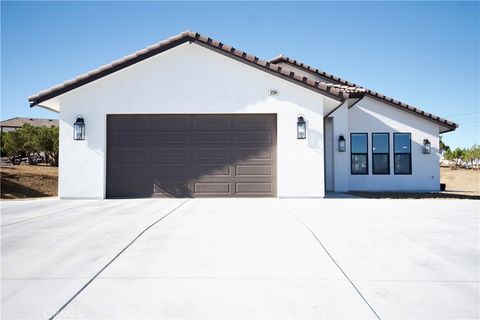 Photo of 8354 Macron St, Oak Hills, CA 92344 (MLS # HD26050953)