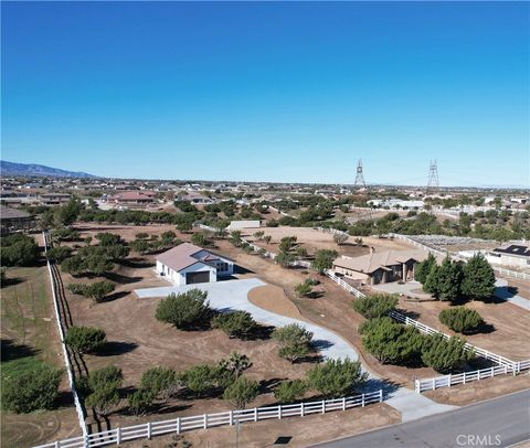 Photo of 8354 Macron St, Oak Hills, CA 92344 (MLS # HD26050953)