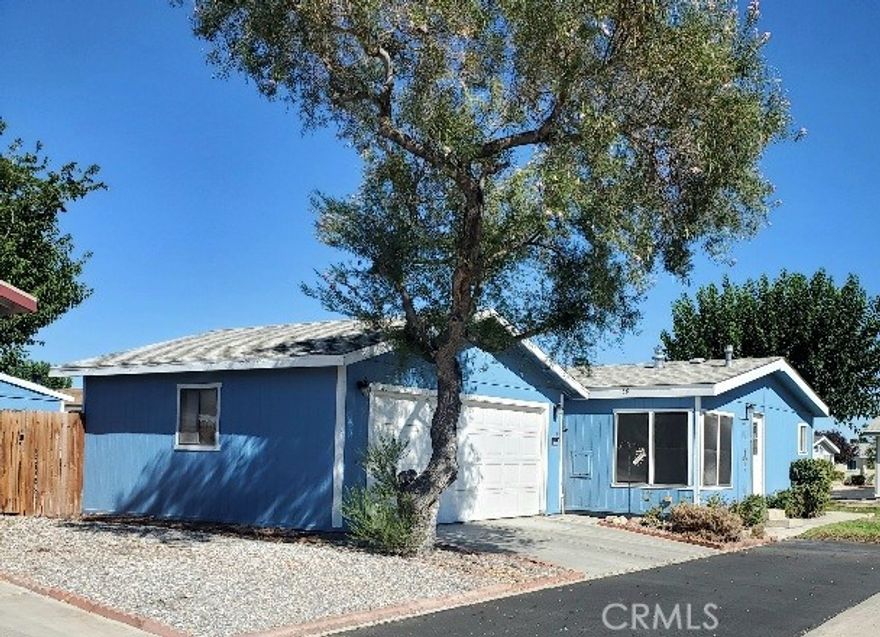 FANTASTIC PRICE for larger 1512 sq ft home in SENIOR 55+ gated community of MOUNTAIN VIEW VILLAS. This home is on a low maintenance lot with HUGE ADDITIONAL SHED along with 2 car garage. FULL NEW HVAC system installed 6 months ago. Updated kitchen cabinets and plenty of counter space to work with. Master suite is away from other bedrooms. Custom fireplace in open living room will be cozy for colder weather coming. The greenbelt gives you the greenery without the maintenance. All rooms are good size with formal dining and eat in area in kitchen. Washer, dryer, fridge will stay with the right offer. Seller has purchased another out of state and is willing to offer decorating concessions. The rear yard has covered patio and very easy to take care of. There is off leash doggy park and a calendar of social activities. One of the best senior living parks in the high desert. Shopping close by and Jess Ranch Market Place just a few minutes away. Don't miss this great buy! We have financing with as little as 5% down.