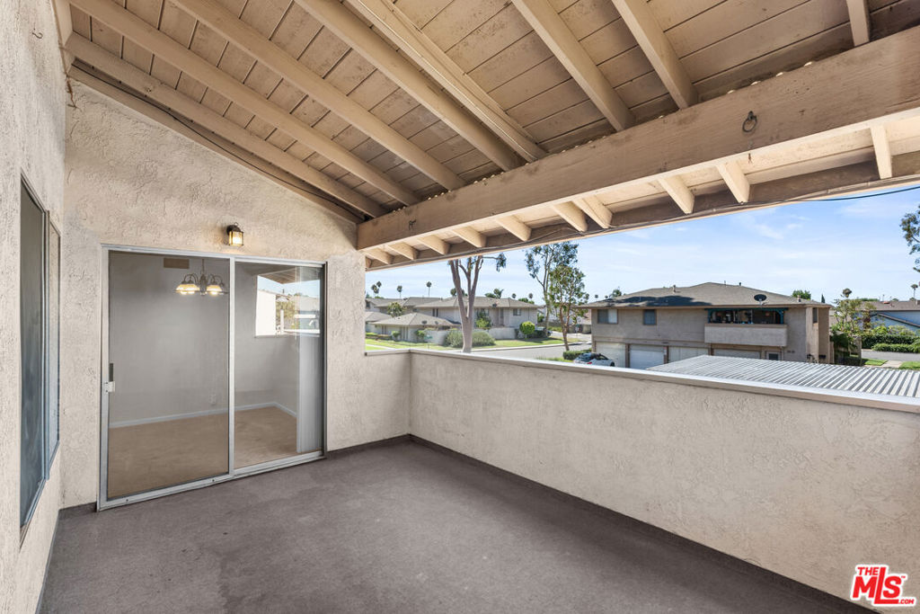 Perfectly positioned on a peaceful interior location, among mature trees and rolling greenbelts, lies this top-floor, corner-unit condo. With only one shared wall, this sun-drenched unit is filled with privacy and quiet enjoyment. Upon entering the gated entry, the extra-large covered patio allows for year-round use and seamlessly flows into the interior, providing the highly desirable indoor-outdoor living experience. A formal living room and dining room provide designated living spaces, all anchored by the kitchen an ideal layout for entertaining. Two large-scale bedrooms offer ample space for a home office. The unit features newer carpet, central A/C, and a private 1-car garage with an additional parking space in front. The private community features a swimming pool & jacuzzi, while the well-managed HOA with low dues covers water, trash, and earthquake insurance. Centrally located, the unit is walkable to multiple eateries, breweries, and shopping options. The Old Town Placentia revitalization plan brings new life to the charming historic district, featuring a new upcoming train station. Sitting as one of the best values in the city, the unit is an ideal opportunity for a first-time homeowner or an excellent investment play.