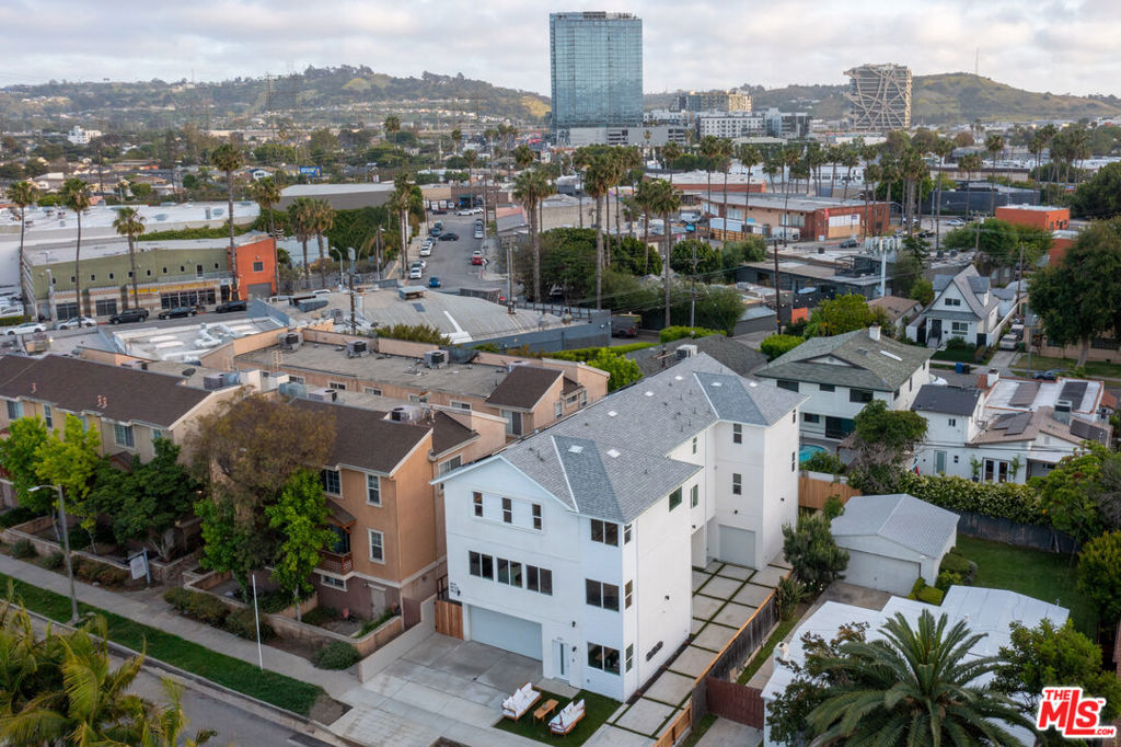 Introducing The David III, a newly built luxury triplex offering approx. 4,800 SF of living space across three vacant, design-forward residences in the heart of Culver City's creative district. This SB-8 exempt, nonrent controlled asset features a total of 11 beds and 9 baths, including a 4BD/3.5BA front unit with private yard, a 3BD/2.5BA middle unit, and a 4BD/3BA rear unit with a full-floor primary suite and expansive backyard. Each home showcases open layouts, designer finishes, custom kitchens, wide-plank flooring, side-by-side parking, and solar panels that reduce utility expenses and boost long-term returns. With projected gross rents of $19,000/month, the offering delivers a CAP rate of approx. 5.61% and a 14.25 GRM based on current pricing. Located minutes from Erewhon, Helms Bakery, and top employers like Amazon Studios, Google, Sony, and TikTok, this is a rare opportunity to own premium new construction in one of LA's fastest-growing submarkets. Contact the listing agent for full financials and private showings.