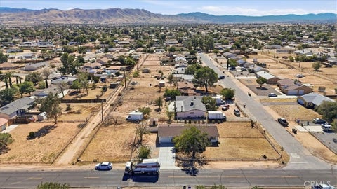 Photo of 21057 Sitting Bull RD, Apple Valley, CA 92308 (MLS # HD26222946)
