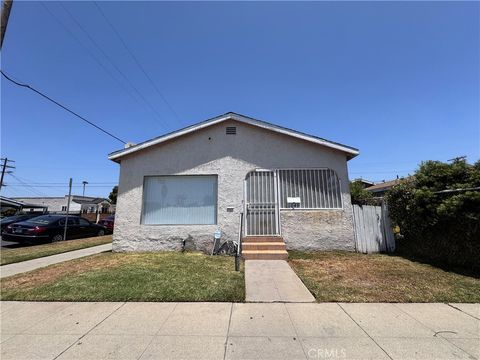 Photo of 1049 W 65th Place, Los Angeles, CA 90044 (MLS # SB25269813)