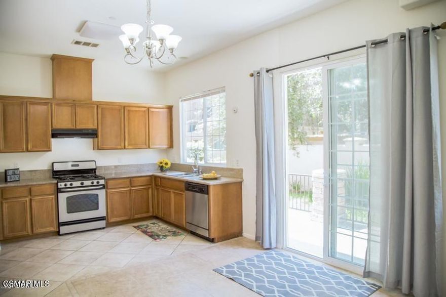 Gorgeous, 3 bedroom, 3 bath townhome on the West side of Simi Valley. High ceilings thru-out with huge master bedroom suite includes walk-in closet and luxurious master bath: soaking tub and separate stall shower. Spacious secondary bedrooms w shared bathroom. Wood Floors throughout. Laundry area upstairs, fireplace in living room plus 2-car garage. Outdoor patio for entertaining. Close to shopping and entertainment! Vacant Move-In Ready!