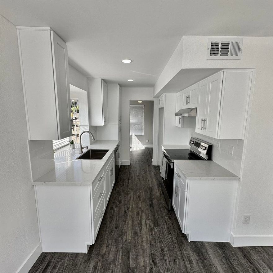 Welcome home to the rarely available 1222 sqft - 3 bedroom and 2.5 bath -  two story condominium. Bottom level features living room, kitchen, laundry room with W/D hookups, under-stair storage, 1/2 bathroom, dining area and spacious patio area with water heater storage closet. Upstairs features 3 bedrooms, 2 full bathrooms, and hallway linen closet. All new vinyl/carpet/baseboard, new kitchen cabinets/quartz countertop, new ceiling fans, new mirrored closet doors. Fresh neutral paint. Community pool. 2 reserved parking spaces. HOA includes trash.