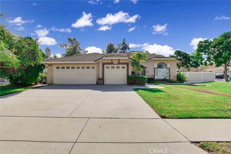 Single-Story Home on a Spacious Corner Lot with No HOA! Welcome to this beautifully maintained Corona residence situated on an impressive 10,890 sq ft corner lot, offering an exceptional blend of space, comfort, and functionality, all without HOA fees. This single-story home features four bedrooms, a three-car garage, and a thoughtfully designed layout with high ceilings and wide hallways that create an open, inviting feel. The expansive family room and additional living area with a gas fireplace provide versatile space for relaxation or entertaining, while the open-concept kitchen includes a large center island, granite countertops, and ample cabinetry designed for everyday cooking and hosting guests. Interior highlights include an indoor laundry room, plantation shutters, ceiling fans throughout, and recent updates such as a newer A/C condenser and water heater. Step outside to a private backyard retreat featuring an above-ground spa (included), beautiful rose bushes, vinyl fencing, and generous space for outdoor enjoyment, gardening, or gatherings. Conveniently located near shopping, dining, and major freeways, this home combines comfort, value, and location in one exceptional package.  Schedule your private showing today!