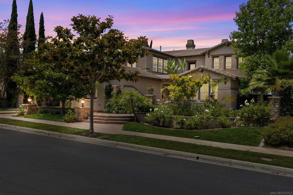 Spectacular home in the desirable La Costa Greens neighborhood with golf course views! Nestled on an expansive 10,000+ sq. ft. lot, come home to this meticulously maintained luxury estate & experience San Diego resort-style living at its best. Boasting incredible curb appeal, you will fall in love with this home from the moment you drive up. With nearly 5,000 square feet of living space & a great 5-bedroom floor plan, with an additional optional room currently used as an office with a Murphy Bed installed, this home is ready to accommodate all your lifestyle needs. Step inside to gleaming wood floors throughout most rooms, natural light, incredible craftsmanship, neutral paint, & a turnkey living experience. The gourmet kitchen is a chef’s dream, featuring a large eat-at kitchen island, granite counters, premium SS appliances including double ovens, & French Country-style cabinetry. The living room & dining room feature luxurious marble flooring. The upstairs primary suite is a true retreat, with a dual-sided fireplace, separate sitting area, private balcony, dedicated office area, & ensuite spa-like bath with a generous soaking tub, dual vanities, separate vanity, walk-in shower, & statement tile flooring. All secondary bedrooms are ensuite, spacious, with ample natural light & wood flooring. Enjoy the sea breezes & San Diego sunshine in your backyard, a custom-crafted blend of hardscape & mature landscaping. Features include gorgeous Roman columns beneath the pergola, a handsome outdoor fireplace, a brand-new built-in BBQ island with new mini-fridge, tranquil water features, & privacy. Additional notable features include zoned A/C & a whole-home speaker system. No neighbors in front or behind you add to this home’s feeling of ultra-privacy. La Costa Greens is one of the most exclusive neighborhoods in Carlsbad, with residents enjoying access to The Presidio, a private clubhouse with top-tier amenities that include a community gym, pool, spa, & tennis courts. The nearby park is a favorite for residents looking to spend time outside. All this plus award-winning San Marcos schools & a fantastic location just a short drive from the luxurious Omni La Costa Resort, world-class golf courses, & Carlsbad’s famous beaches.