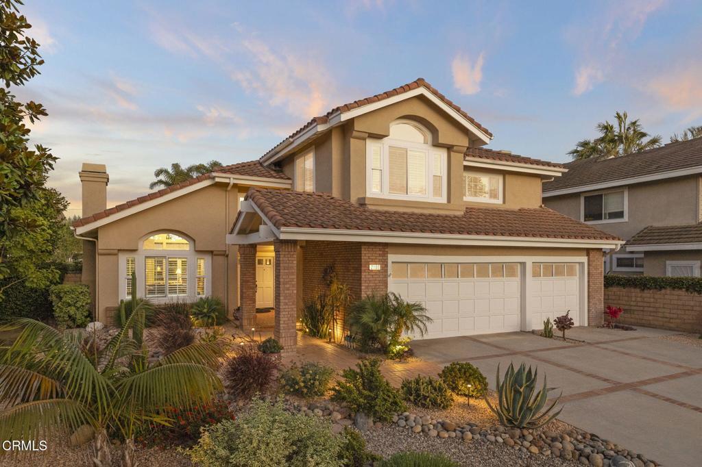 Meticulously maintained and thoughtfully designed, welcome to 2106 Fox Den Ct--a stunning two-story JM Peters home nestled in the prestigious River Ridge community. Set on a manicured 6,751 sq ft lot with 3,304 sq ft of refined living space, this 4-bedroom, 3-bathroom residence is a true testament to pride of ownership.From the moment you arrive, the home's impressive curb appeal, upgraded front hardscape, and lush, drought-tolerant landscaping set the tone for what awaits inside. Step through the double-door entry into soaring ceilings, a sweeping staircase, and light-filled living spaces that balance elegance with comfort.The fully remodeled kitchen is a chef's dream, featuring Silestone quartz countertops, soft-close drawers and cabinets, a sleek stainless-steel range hood, and a spacious island with bar seating. Large windows along the kitchen and dining area frame garden views and fill the home with natural light, while the adjacent family room and wet bar provide the perfect setting for entertaining.The versatile floor plan includes a downstairs bedroom and full bath, ideal for guests or a home office. Upstairs, the grand primary suite offers a cozy fireplace, private balcony, and spa-like bath with a soaking tub, walk-in shower, dual vanities, and expansive closet space. Secondary bedrooms located off of the large great room are generously sized and feature plush carpet and mirror closet doors. A beautifully landscaped backyard offers a private escape with custom pavers, a pergola strung with cafe lights, and multiple zones for lounging and dining. Surrounded by mature trees and colorful plantings, it's a serene outdoor retreat perfect for gatherings or quiet evenings.Additional features include an AP-controlled dual-zoned HVAC system and a host of quality finishes throughout the home.Residents of the River Ridge community enjoy resort-style amenities including a sparkling pool, spa, pool house, tennis/pickleball court, and a beautifully maintained park-like greenbelt that flanks the scenic River Ridge Golf Course. Whether you're hosting, relaxing, or enjoying a peaceful morning walk, this community offers an unmatched lifestyle in the heart of Oxnard.Don't miss this opportunity to own a truly turnkey home in one of the area's most desirable neighborhoods.
