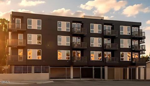 Photo of 18900 Parthenia Street #402, Northridge, CA 91324 (MLS # P1-26320)