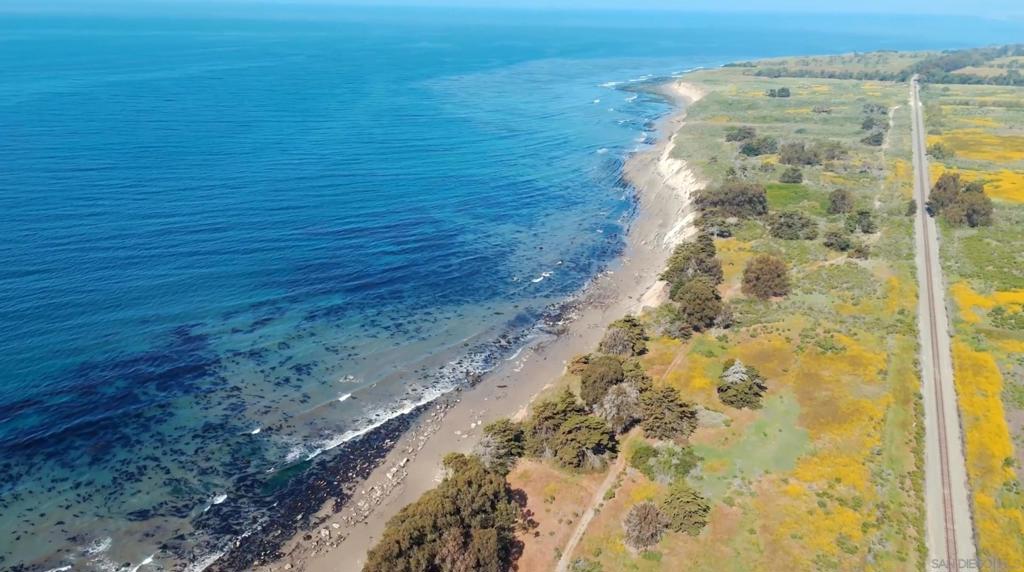 Discover an extraordinary investment and development opportunity on California’s iconic Gaviota Coast. Presenting Paradiso Del Mare and Tomate Canyon Ranch—two remarkable coastal properties spanning 208 acres with more than one mile of stunning ocean frontage. Paradiso Del Mare offers 140 acres of unrivaled luxury, perched on cliffside bluffs with direct beach access. Approved permits are secured for two luxury residences, including an ocean-facing lot with plans for a more than 8,500-SF Ocean Estate (including garages and guest house) and a second lot with plans for a nearly 10,000-SF Inland Estate (including garages and guesthouse) and 1.7 acres of an agricultural envelope for orchards, equestrian use, and more. The site blends elegance, privacy, and a world-class surf experience. Tomate Canyon Ranch is a neighboring, proposed luxury subdivision on a 65-acre parcel featuring 6 lots, with each lot having proposed residences with Gross Floor Areas ranging from more than 7,300 SF to 11,700 SF. Imagine a collection of private estates rising above dramatic ocean views, where architectural brilliance meets natural serenity. Conveniently located minutes from Montecito and moments away from the Santa Barbara Airport, this location provides vibrant dining, high-end boutiques, art galleries, and theaters. Embrace the best of both worlds, transitioning between the vibrancy of urban life and the tranquility of a coastal sanctuary.
