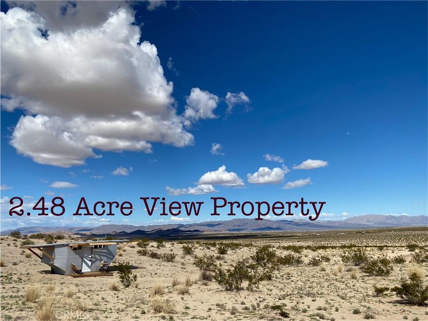 2.48 Acres with an exceptional view in all directions. Easy access from Hwy 62. Structure on property is optional with purchase. Zoned Rural Living. Great custom home site. Consider the possibilities with a well and off grid living? Drive by and check it out.