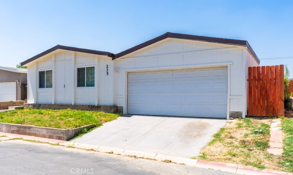 Remodeled Double wide home on Land in gated community. Home features 2 bedrooms and 2 bathroom manufactured home with bonus room. Home has been completely remodeled and updated throughout. Must see to appreciate. New plumbing and updated wiring is also been installed recently. Subject also has a backyard and is located in a well maintained gated community. The community features a clubhouse and community pool. The subject is within 5 to 10 miles of shopping, places of worship, freeways and schools. Move in ready, a must see.
