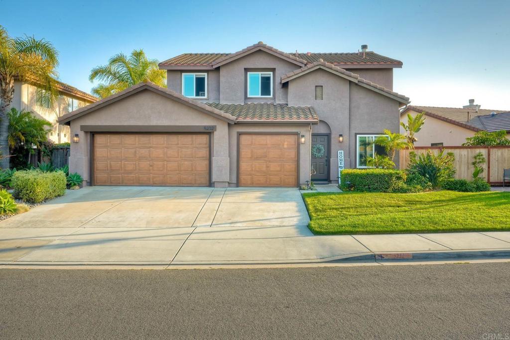 Welcome to your dream home at 5232 Palmera Dr, a stunning detached single-family residence in the charming city of Oceanside, CA. This beautifully maintained home offers 1,983 square feet of living space, featuring four spacious bedrooms and two-and-a-half bathrooms, perfect for modern family living. Step inside to an inviting foyer that leads to a bright and open living area. The home boasts elegant plank tile flooring and recessed lighting throughout, creating a warm and welcoming atmosphere. Brand new efficient patio door and windows installed throughout the entire house, with a transferable warranty. The kitchen is a chef's delight, equipped with a new low profile microwave, new dishwasher, gas oven, and gas stove, along with an open kitchen layout that invites culinary creativity and social gatherings. Cozy up by the working fireplace on cooler evenings or head outdoors to enjoy the exquisite private patio. The backyard is an entertainer's paradise. Featuring an in-ground pool & spa combo with a state-of-the-art sanitizing package that includes a salt water, ozone and UV sterilization system. Control your entire back yard from heating, waterfalls, laminars and the 27 light colors and shows, all from your WiFi device, Apple Watch, or Alexa! Ignite the poolside fire bowl and fire pit for relaxing evenings! Enjoy the outdoor kitchen that includes a kegerator, refrigerator, sink, barbecue and under the counter lighting to entertain all your guests. Backyard is complete with water efficient and lush landscaping. Additional features include a convenient laundry room with washer/dryer hookup, a brand-new water heater, and a secure 3 car finished garage. House includes a paid off 17 panel solar system with a transferable warranty for an energy efficient home. Central heating and air conditioning ensure year-round comfort for you and your family. Embrace the ultimate California lifestyle in this exceptional home, where every detail has been thoughtfully designed for comfort, convenience, and style. Don't miss the opportunity to make this your new haven in the heart of Oceanside.