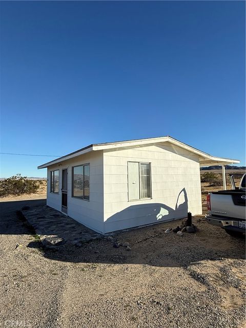 Photo of 86725 Misty Trl Trl, 29 Palms, CA 92277 (MLS # JT26005791)