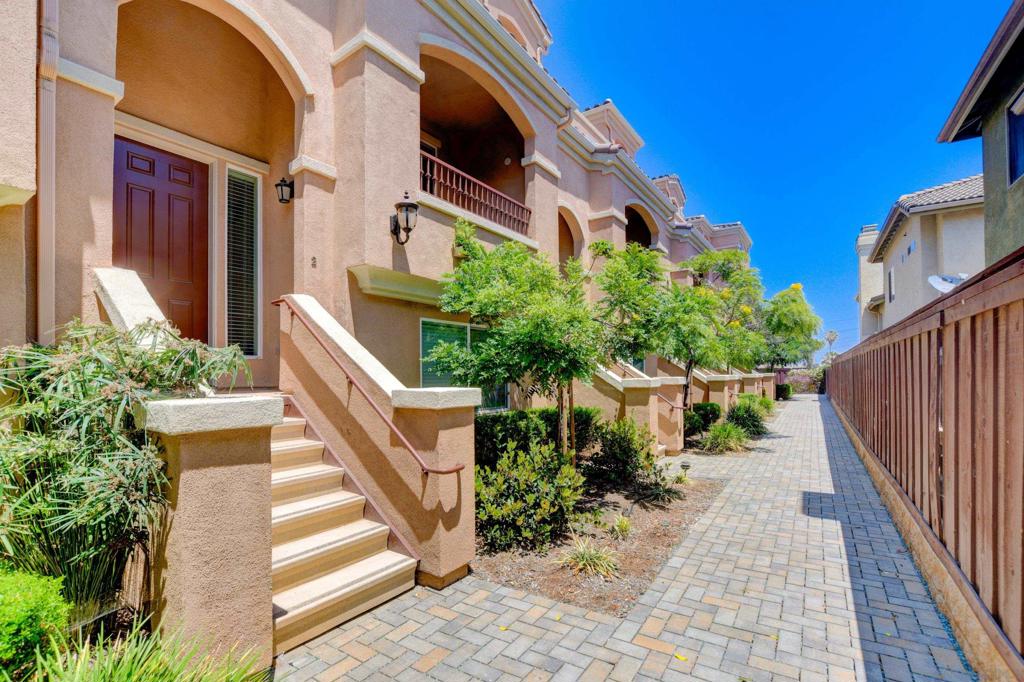 Lovely tri-level Townhome FOR RENT Ready end of May/Early June. Located in the Bahia Vista Community, this 1600+ sq. ft., 3 bedroom, 3 bathroom, plus a two-car garage townhome featured a large kitchen, tons of natural sunlight, ocean views from some rooms, high ceilings, and in a very central location to all! The entry level of the property is the garage, then one bedroom plus a full bath, 2nd level is where the front entryway is with the living, dining, and kitchen area plus a balcony off the living room. Level 3 features the master suite with a dual sink vanity, walk-in closet, private balcony facing East, another bedroom with en suite bathroom + ocean views facing to the West, plus a hallway laundry area. The townhome has central AC/heat, and side-by-side laundry hook-ups and was built in 2016! The community is gated and has some common area community spaces. View: City