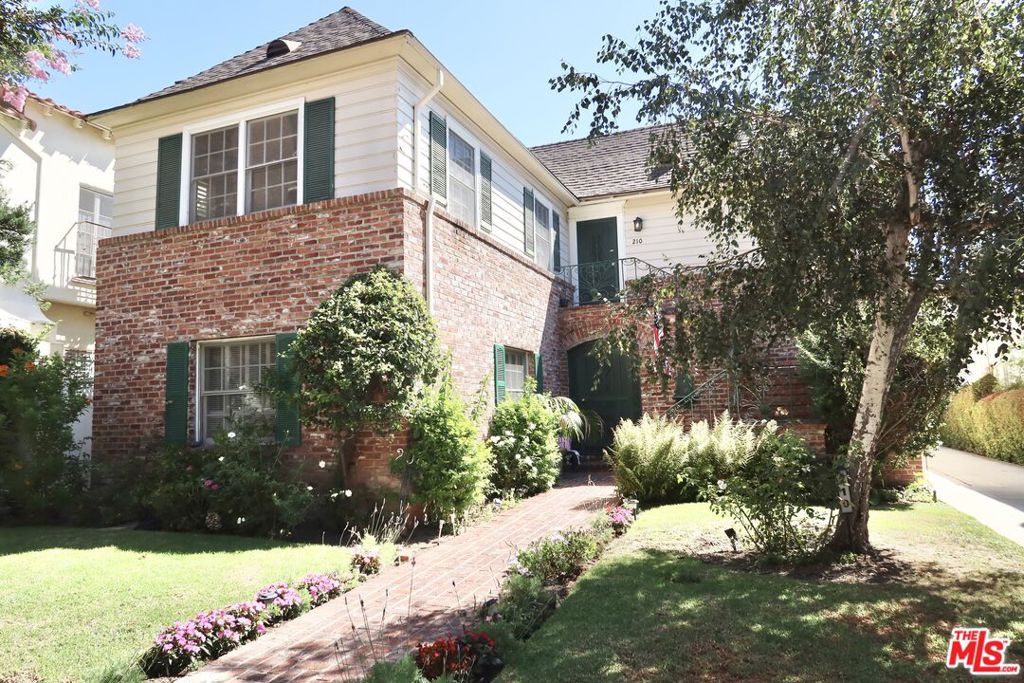 Welcome to 210 S Spalding Dr, a charming 3 bedroom, 2 bathroom duplex in the heart of Beverly Hills. This 1,950 sq ft top floor residence blends vintage charm with modern touches, creating the perfect balance of character and comfort. Step inside and be greeted by an inviting living room with abundant natural light and a cozy gas fireplace. The home features an additional living room with double doors that can easily be converted into a home office or fourth bedroom. The kitchen has been thoughtfully upgraded with new stainless steel appliances and complemented by a full laundry room for convenience. Each of the three large bedrooms offer walk-in closets, while the primary suite includes a private balcony for morning coffee or evening relaxation. Enjoy side by side parking in a 2 car garage with additional storage; a rare find in Beverly Hills. Tenant is responsible for all utilities, while the owner covers gardening service. Just steps away from world class restaurants, cafes, nightlife, and iconic shops, this location puts you at the center of Beverly Hills' most iconic destinations. This residence offers plenty of space and flexibility to make it truly your own. A wonderful opportunity to enjoy Beverly Hills living at its finest. Available now!