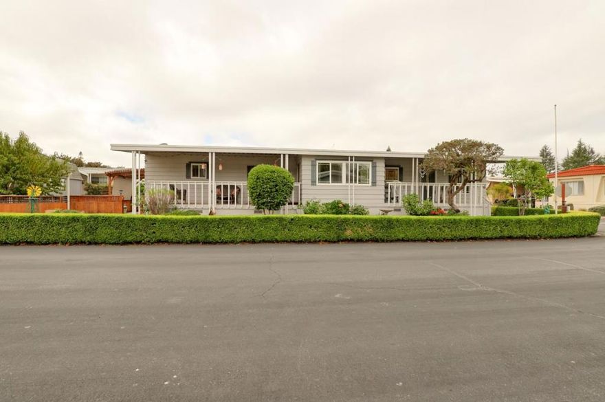 Amazing new holiday price of only $435k! Lovely updated 1,536 sq ft home on a terrific corner lot with welcoming front and rear covered decks perfect for relaxing or entertaining. The spacious family room has an open feel and the addition creates a versatile office area. Enjoy a beautifully remodeled kitchen with tile counters, breakfast bar seating, and light cabinetry, plus tastefully updated baths. Upgrades include sheetrock walls, dual-pane windows, newer furnace and A/C, updated plumbing, earthquake bracing, and more. (Home is actually over 1600 sf with added office off family room!)  Two bedrooms and two full baths are complemented by the added office space for work or hobbies. Bright living and dining areas flow easily to the kitchen, while the outdoor spaces offer both privacy and charm. A well-maintained home with thoughtful improvements and plenty of room to spread out. Move-in ready and waiting for its next owner.  Enjoy access to clubhouse, pool, spa, gym, tennis, and RV parking. A must-see gem in Woodland Estates, Morgan Hills most desirable senior park; one of only two resident owned parks in Santa Clara county!  Woodland Estates is a resident owned senior park with a low park fee of only $370/mo including water, sewer & garbage!