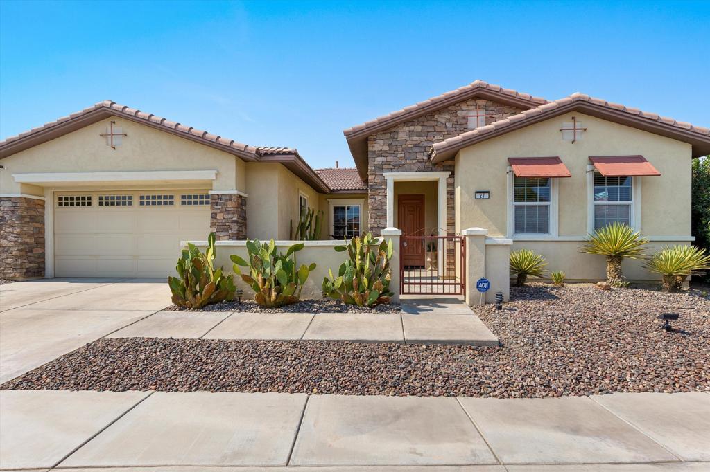 Welcome to your dream home in Tuscany, Rancho Mirage! This elegant single-level Tuscan-style residence offers 3 bedrooms, 3 baths, complete with a den, formal dining room, and breakfast nook. Sun-drenched interiors feature soaring ceilings, tile and carpet flooring, and recessed lighting. The gourmet chef's kitchen, complete with granite countertops, center island, dual sinks, dual ovens, and maple cabinetry, seamlessly flows into an inviting family room with a beautiful stacked stone gas fireplace. Outside, a private, entertainer-ready backyard invites you to build your pool or relax under the California sun. Nestled in a secure gated enclave, enjoy resort-style amenities: heated pool & spa, BBQ area, playground, dog park, and scenic greenbelts. With low HOA dues and an unbeatable location near top-tier dining, shopping, golf, and the airport, this exceptional home captures the ultimate desert lifestyle. Location is everything and this home is centrally located with easy freeway access. You'll be just minutes away from the nightlife, dining, and shopping of downtown Palm Springs, the entertainment of the new Acrisure Arena in Palm Desert, local casinos, hiking, the local park and dog park. This home is walking distance to the newest high school in the Coachella Valley, Rancho Mirage HS, and just minutes away from Eisenhower Medical Center, the region's primary medical hub, and recently ranked among the Top 100 hospitals in the U.S. in 2024. You're also just a quick drive to the luxury high-end shopping of Palm Desert's El Paseo, the Indian Wells Tennis Garden, and Indio's world famous music festivals! It's hard to believe you can own a home in the beautiful city of Rancho Mirage for under a million dollars in a gated community with an HOA of just over $200 - and that INCLUDES your cable and internet! You HAVE to see this one in person to see all it has to offer. Schedule your private showing today!