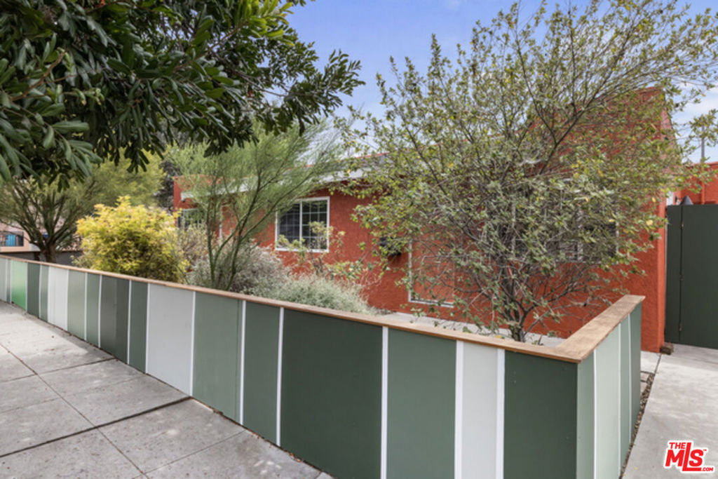 Charming home ideally located between Silver Lake and Virgil Village. This bright and airy residence features an open concept layout, and California native and drought tolerant plants in the front yard create a warm and welcoming atmosphere. The home includes two kitchens, two living rooms, four bedrooms, and two bathrooms. Currently used as a single family residence, it can also function as two separate two bedroom one bathroom units, ideal for extended family or a home office. One of the living rooms opens with French doors to a private yard, perfect for creating your own garden retreat. Additional highlights include three parking spaces, extra storage beneath the house, and fresh exterior paint! Close to Sunset Junction, Griffith Observatory, Dodger Stadium, and neighborhood favorites such as Squirl, Melody, Courage Bagels, Cafecito Organico, Be U, Intelligentsia Coffee, Erewhon Market, vintage shops, and the Silver Lake Farmers Market. A beautiful urban retreat awaits its new owner, offering comfort, charm, and an unbeatable location.