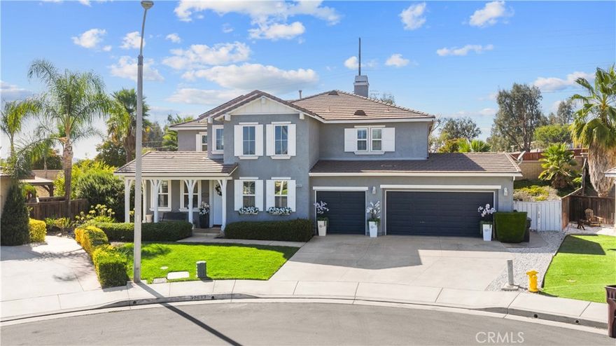 LUXURY CUL-DE-SAC HOME w/ PAID SOLAR & ADU POTENTIAL! Welcome to this pristine, spacious 5-bedroom, 3.5-bath residence, perfectly tucked away on a quiet cul-de-sac. Immediately impressive, the bright and airy formal living/dining room combination welcomes you inside. The gourmet kitchen is a chef's dream, featuring luxurious stone countertops, an oversized island, a custom-built breakfast table, abundant cabinetry, and a walk-in pantry with a dedicated coffee bar. Relax in the large family room centered around a cozy fireplace. A dramatic, winding staircase leads to three generous secondary bedrooms and the massive Primary Suite. The primary bedroom is a true retreat, boasting his-and-hers walk-in closets and an opulent en-suite bath with dual sinks, a separate soaking tub, and a glass-enclosed shower. Complementing the luxurious interior is a fabulous entertainer's backyard. Step out to the expansive covered patio and enjoy the meticulously manicured yards. The property sits on a large, pie-shaped lot, offering ample space for a future pool or ADU. Enjoy significant savings with PAID-OFF SOLAR and benefit from a spacious 3-car garage. This impeccable, move-in-ready home offers the perfect blend of elegance, comfort, and top-tier features. Schedule your private viewing today!