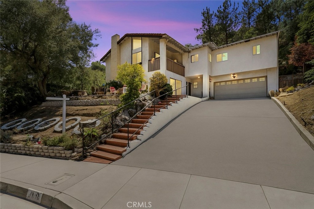 Nestled in the highly sought-after Verdugo Woodlands of Glendale, this remarkable home perfectly blends contemporary comfort with classic Mediterranean Spanish style. Offering 6 bedrooms and 5 bathrooms across 3,243sqft. This residence is thoughtfully designed to accommodate both everyday living, and elegant entertaining. Among the bedrooms are two private suites, providing convenience and privacy, while one features a charming terrace with tranquil views, an ideal spot to enjoy morning coffee or unwind at sunset. Resting on an impressive 23,050sqft lot, the property delivers expansive outdoor space with endless potential for leisure, recreation, or future enhancements. Architectural details highlight the warmth of Spanish design enhanced by modern touches, creating an inviting and timeless atmosphere. The home features natural sun-filled living areas, a gourmet kitchen tailored for the culinary enthusiast, and a spacious den just off the kitchen, perfect for gatherings, work, or relaxation. Located in one of Glendale’s most desirable neighborhoods, this residence offers both privacy and convenience, with close access to winning award schools, parks, shopping, dining, and major freeways. This Verdugo Woodlands estate is a rare opportunity to own a stylish, expansive home on an oversized lot in one of Glendale’s most coveted communities.