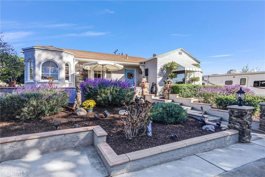 This 1935 charmer captures the essence of Claremont’s architectural heritage, beautifully blending classic character with thoughtful modern updates. Nestled in the sought after North Claremont Sumner / Piedmont Mesa neighborhood, just minutes from the Claremont Colleges, village shops, local dining, and Claremont’s famous hiking and walking trails, this home offers a rare combination of history, charm, and everyday comfort.
Lovingly maintained, it features beautiful waterproof luxury vinyl flooring, a remodeled kitchen, refreshed bathrooms, a new HVAC system, complete copper re-plumb, refinished lighting, and elegant finishes throughout. The kitchen showcases soft close drawers, a real stone backsplash, and custom cabinetry with an open China alcove that highlights the home’s timeless craftsmanship.
Tucked away from the street behind its own private gate, the property is approached via a long private driveway, creating a hidden oasis of peace and serenity. Mature landscaping surrounds a stamped concrete courtyard and a spacious lot, offering the perfect blend of privacy, outdoor entertaining, and expansion potential. Between the private front courtyard, extended driveway with RV parking, and expansive rear yard, this home provides exceptional versatility and tranquility.
Inside, you’ll find a cozy breakfast room with built in cabinets, a convenient indoor laundry room with attic access, and a detached 2½ car garage with abundant shelving and storage.
This is a rare opportunity to own a private, gated sanctuary in Claremont’s North Claremont Sumner / Piedmont Mesa enclave, where vintage charm, modern upgrades, and secluded serenity come together in perfect balance.